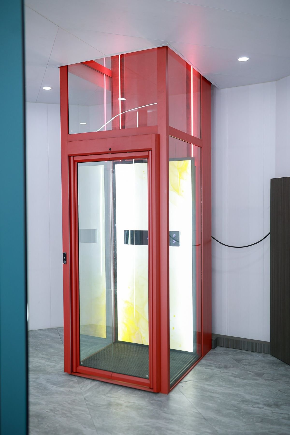 Levitex Signature with a red frame on the ground floor of a double-storey hall.