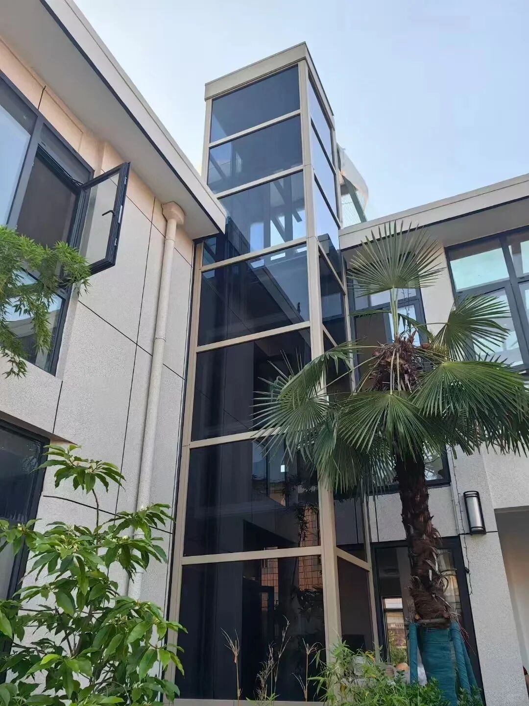 Levitex Plus in a glass shaft on the outside of a house.